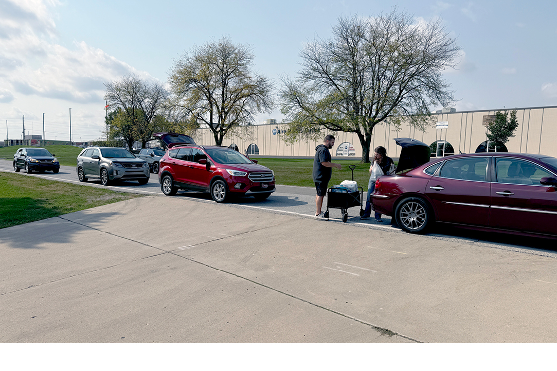 Line of cars from the community donating to Buchanan campaign