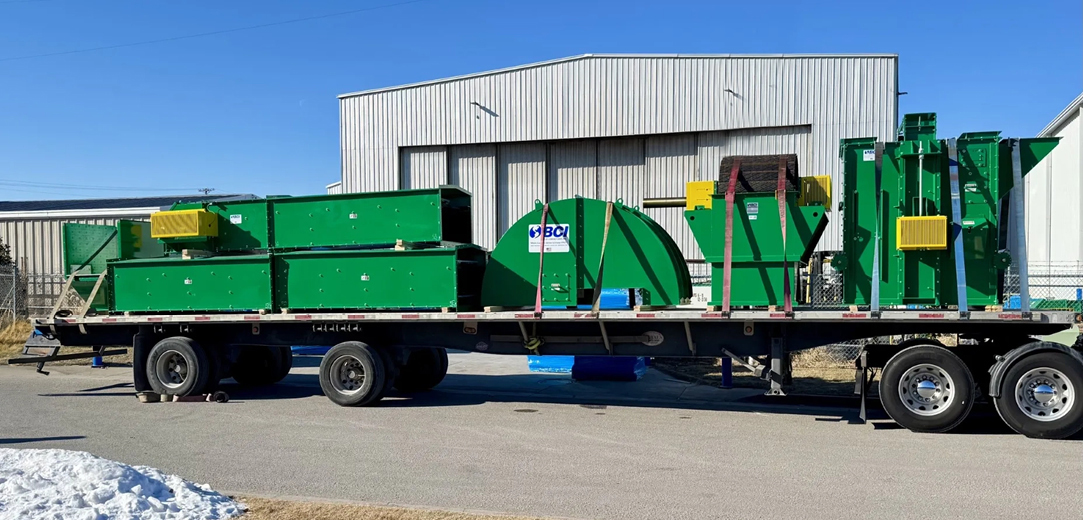Buchanan Hauling and Rigging transports an elevator system using their stepdeck trailer.